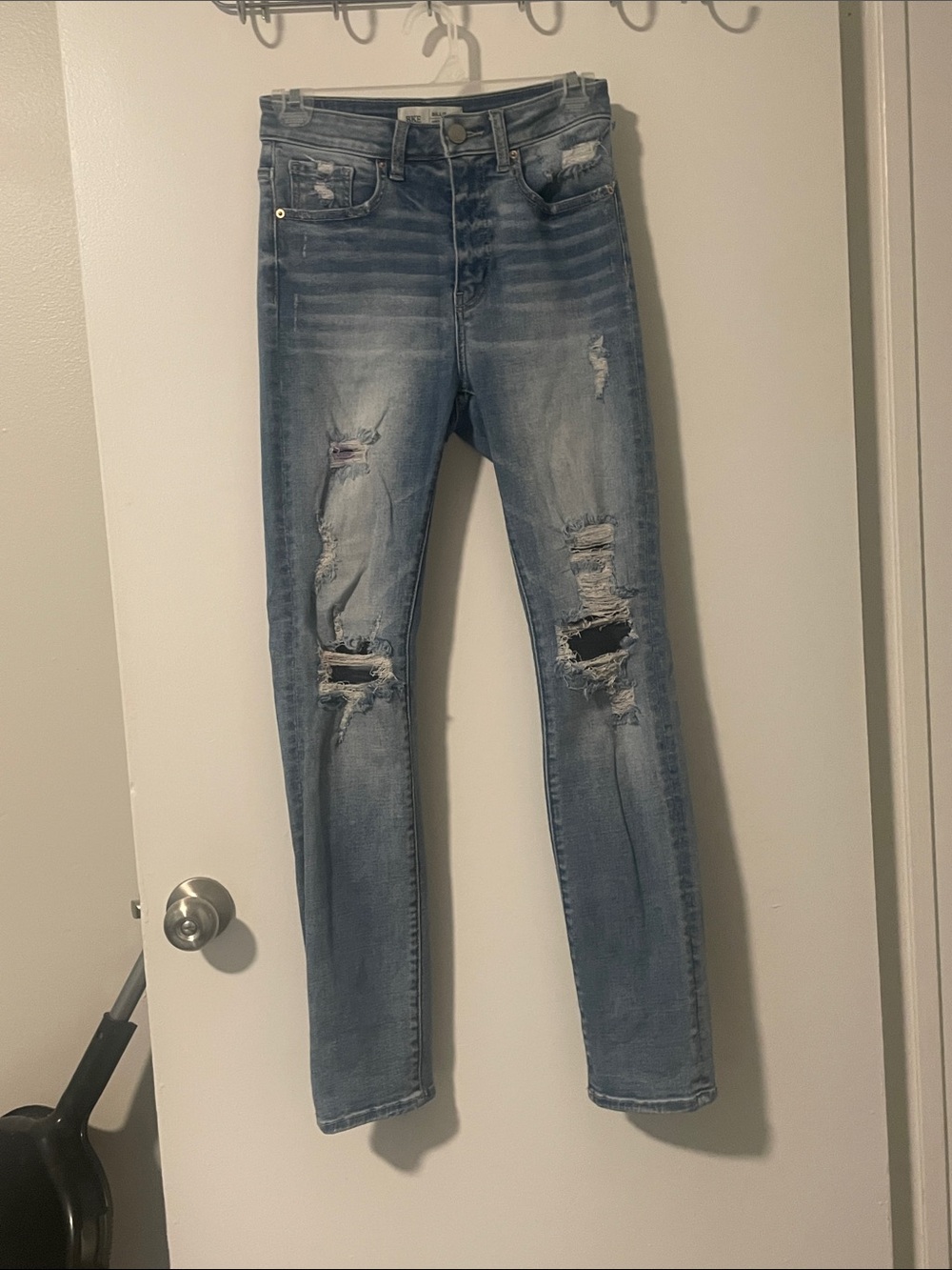 Size 25 Women’s buckle BKE denim dust jeans slim fit high rise